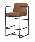 Brown leather bar stool with black metal frame on a white background