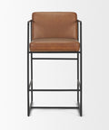 Brown leather bar stool with black metal frame on a white background