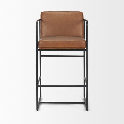 Brown leather bar stool with black metal frame on a white background