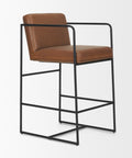 Brown leather bar stool with black metal frame on a white background