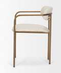 Chair with gold frame and white cushion on a white background