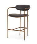 Bar stool with black leather seats and gold metal frame on a white background