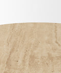 Close-up of a beige stone surface with natural patterns