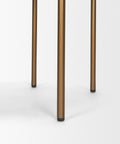Three bronze-colored cylindrical objects on a white background