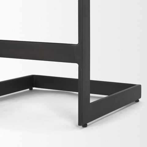 Black metal table leg on a white background