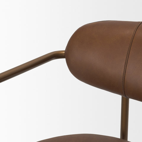 Close-up of a brown leather chair with a metal armrest on a white background