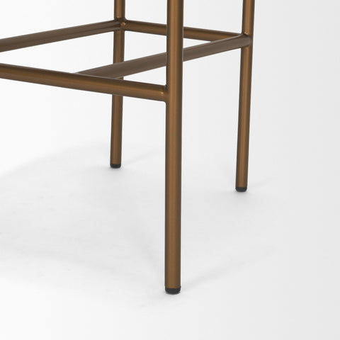 Close-up of a bronze metal chair frame on a white background