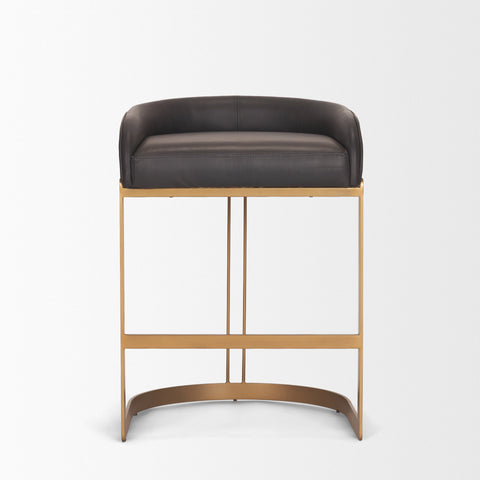 Bar stool with black cushioned seat and gold metal frame on a white background