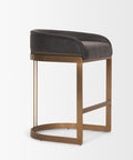 Bar stool with black cushioned seat and bronze frame on a white background