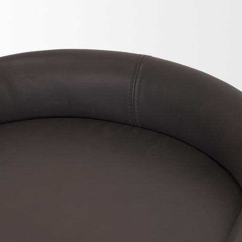 Close-up of a black leather chair on a white background