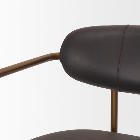 Close-up of a brown leather chair with metal armrests on a white background
