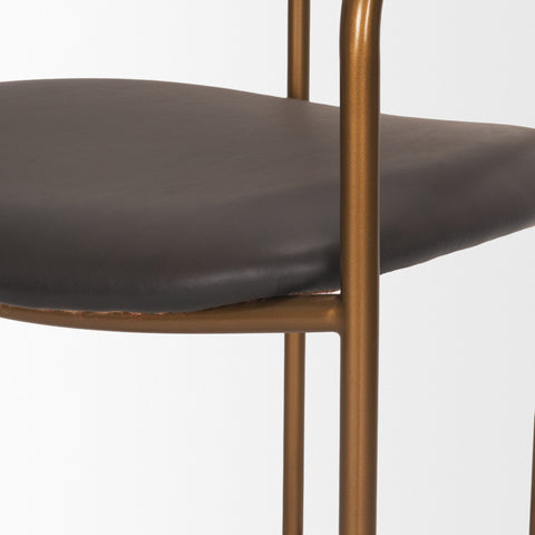 Chair with brown cushioned seat and gold metal frame on a white background