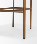 Close-up of a bronze metal chair frame on a white background