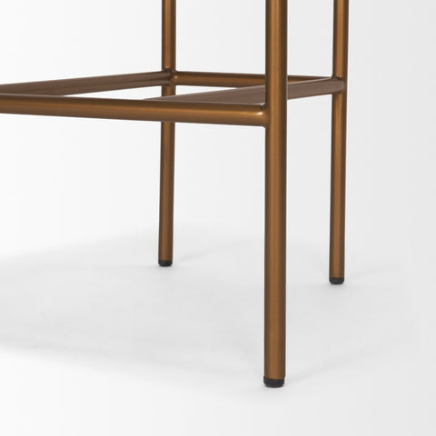 Close-up of a bronze metal chair frame on a white background