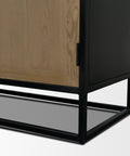 Wooden cabinet with black metal frame on a gray background