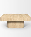 Beige stone coffee table on a white background