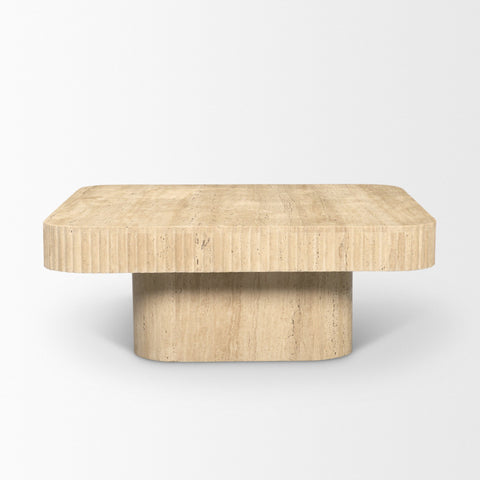 Beige stone coffee table on a white background