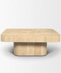 Square wooden coffee table with a textured surface on a white background