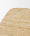 Close-up of a textured beige surface with a white background
