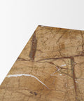 Close-up of a textured brown surface with visible cracks and imperfections on a white background