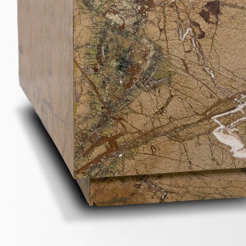 Close-up of a textured brown box with a detailed surface pattern.
