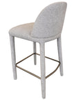 Gray bar stool with a textured seat and backrest on a white background