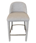Gray upholstered bar stool with metal legs on a white background