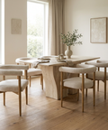 Dining room with wooden table and chairs in a bright room