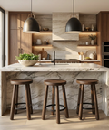 Modern kitchen with marble island and wooden stools