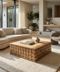 Modern living room with a beige sofa, wooden coffee table, and decorative elements.