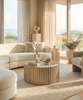 Modern living room with beige furniture and large windows