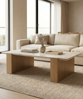 Modern living room with beige sofa and wooden coffee table.