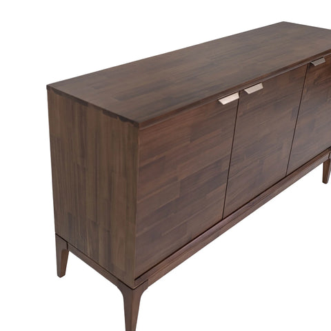 Wooden sideboard with three doors on a white background