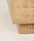Close-up of a wooden surface with a textured finish on a white background