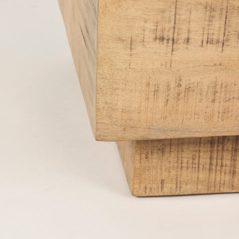 Close-up of a wooden surface with a textured finish on a white background