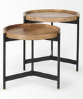 Two round wooden tables with black metal frames on a white background