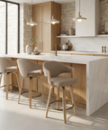 Modern kitchen with marble island and bar stools