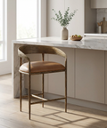 Wooden bar stool with brown cushion in a modern kitchen setting