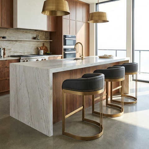 Modern kitchen with marble island and gold bar stools