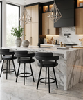Modern kitchen with marble island and bar stools