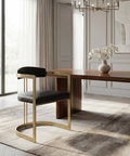 Modern dining room with wooden table and chair, decorative elements, and large windows.